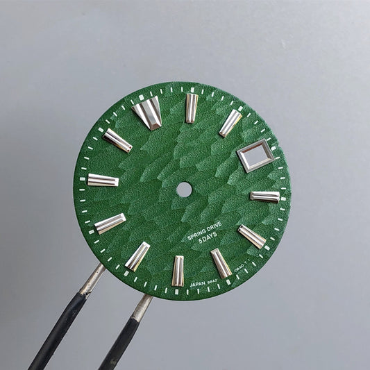 5.1 green dial with s logo