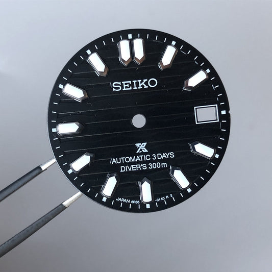 P4 black dial with s logo